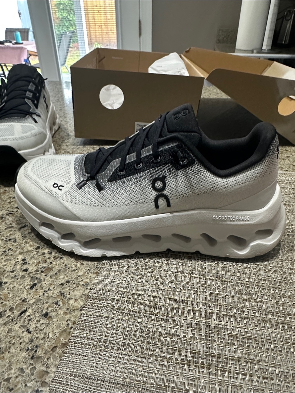 On Women's Cloudmonster Lightweight White and Black Running Sneakers